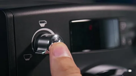 Adjusting dose on automatic coffee machine Stock Footage 160160142