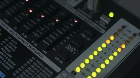 Adjusting EQ Faders on Digital Audio Mixer Stock Footage 319586690