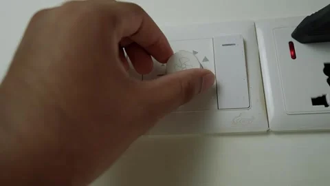 Adjusting Fan Speed Control Knob, Hand adjusting a fan speed control knob o.. Stock Footage 317737285