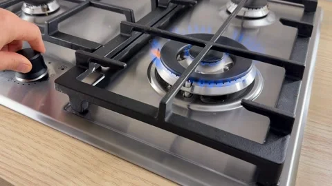 Adjusting Gas Stove Stock Footage 319021339