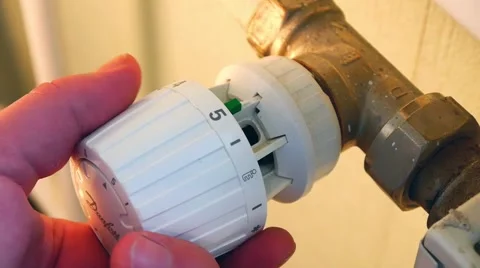 Adjusting the heating in the apartment 2 Stock Footage 47326135