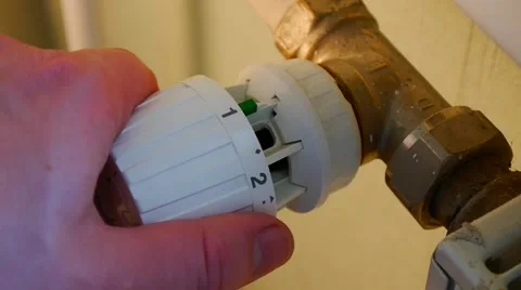 Adjusting the heating in the apartment 3 Stock Footage 47326137