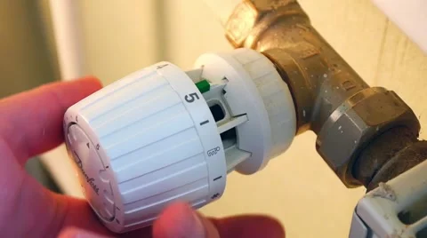 Adjusting the heating in the apartment 4 Stock Footage 47326134