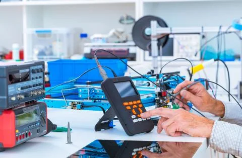 	Adjusting an industrial robot with a CNC computer control 写真素材