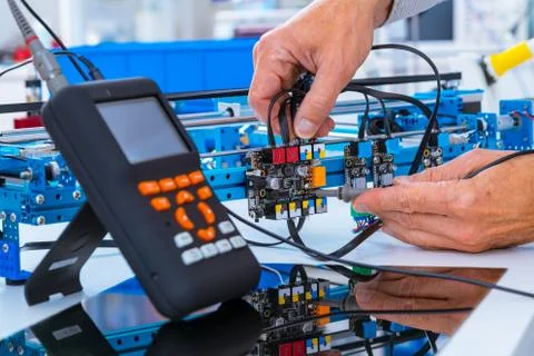 Adjusting an industrial robot with a CNC computer control 写真素材