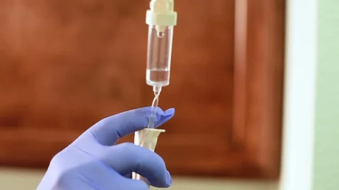 Adjusting the IV Dose. Stock Footage 89078930