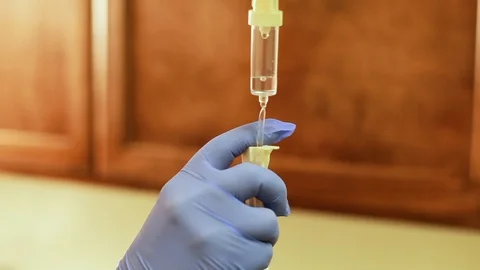 Adjusting the IV Stock Footage 89078641