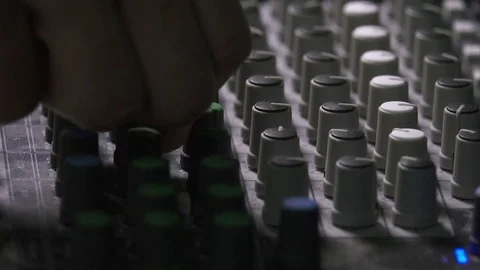 Adjusting Knobs and Levers on Mixing Console, Close up Hands Stock Footage 81926934