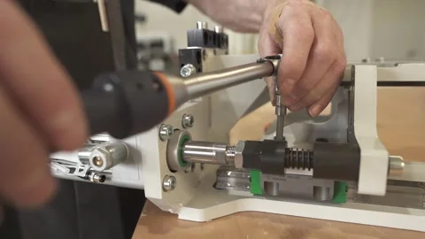 Adjusting Lead Screw Drive on Precision Linear Module Stock Footage 331342273