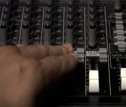 Adjusting levels on audio mixer Vídeos de archivo 41099145