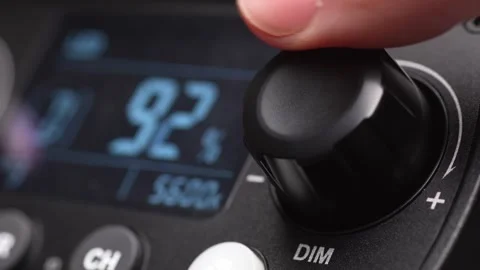 Adjusting Light Intensity on Control Panel. Stock Footage 256234602