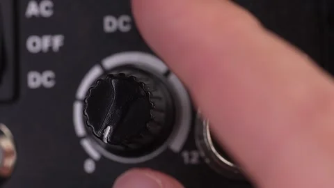 Adjusting Light Intensity on Control Panel with Fingers. Stock Footage 256236435