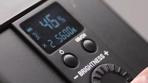 Adjusting Light Intensity on Digital Control Panel. Stock Footage 256237226