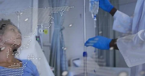 Adjusting nurse lab coat securing IV bag at hospital bed, patient in blue gown, Stock Photos