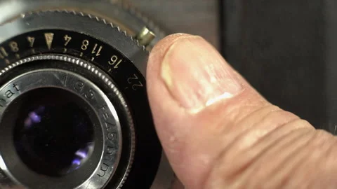 Adjusting an old vintage camera and taking a picture Stock Footage 201756651