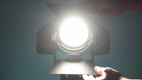 Adjusting a Studio Light's Focus. Stock Footage 259177192