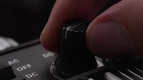 Adjusting the Switch on Electronic Device. Stock Footage 256236592