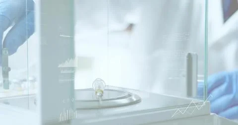Adjusting tech in lab-coat, gloves using tool on bulb on balance in glass Stock Photos