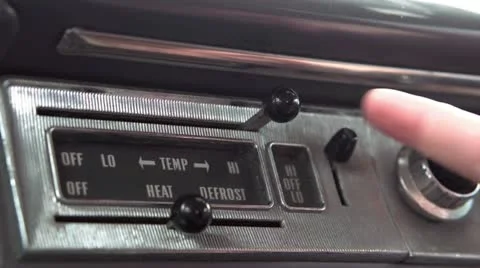 Adjusting temperature control in classic car 库存影片 12409003