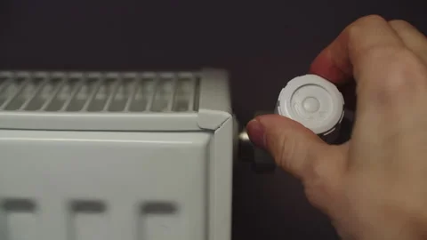 Adjusting the temperature of the radiator in the apartment Stock Footage 270515576