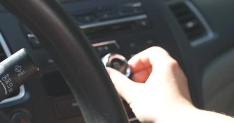 Adjusting the volume on a car radio Stock Footage 113360053