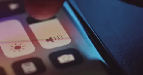 Adjusting volume on device screen - close up Stock Footage 256043505