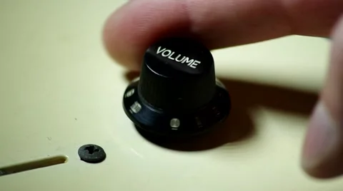 Adjusting the volume on an electric guitar Stock Footage 46832722