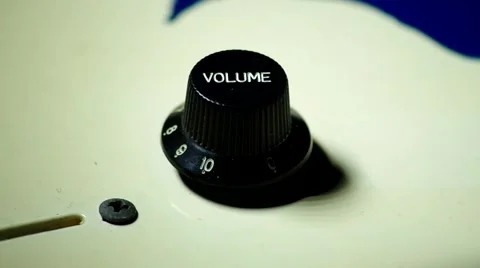 Adjusting the volume on an electric guitar Stock Footage 46832847