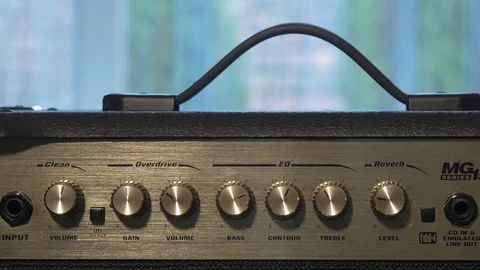 Adjusting volume knobs 스톡 동영상 87361039