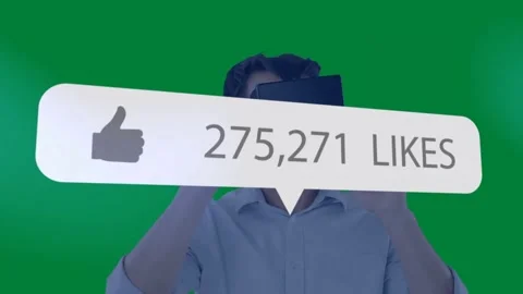 Adjusting VR headset, man in light button shirt watching rising like-count Stock Footage 334112557