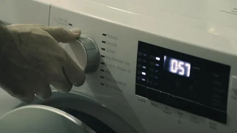 Adjusting Wash Settings on Washing Machine Close Up Stock Footage 329965695