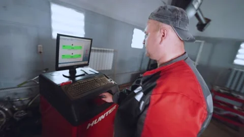 Adjustment of camber convergence on a 3D stand, car service Stock Footage 211878159