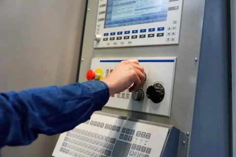 Adjustment of CNC machine operation parameters Stock Photos