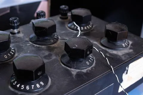 Adjustment knobs on the electronic device closeup Stockfoto's