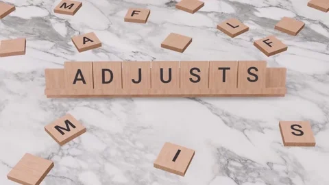 ADJUSTS word written on scrabble Stock Footage 257394945