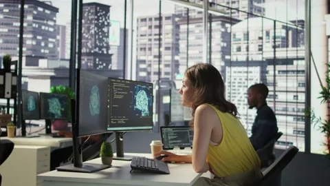 Admin and coworker conducting experiments and tests to optimize AI Stock Footage 318162828