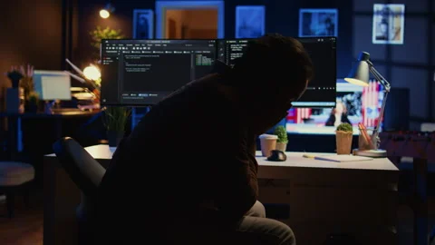Admin in apartment exasperated by annoying bugs while programming Stock Footage 265507570