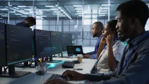 Admin in data center drinking coffee and implementing AI systems Stock Footage 319543715