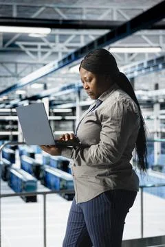 Admin on data center industrial platform analyzing infrastructure performance Stock Photos