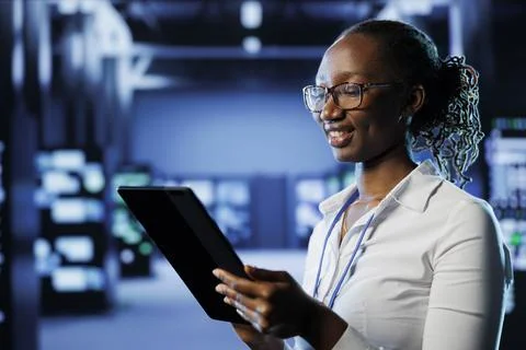 Admin in data center with laptop Foto stock