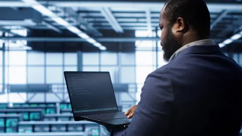 Admin in data center running error checking utilities on tablet to fix hardware Stock Footage 277645528