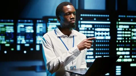 Admin ensuring data center is equipped 写真素材