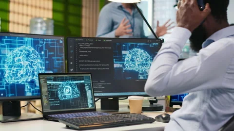 Admin in office relies on AI machine learning to run tasks across devices Stock Footage 313165692