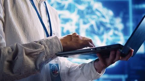 Admin performs AI simulation on laptop 写真素材