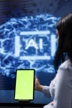 Admin running AI cognitive computing tech on mockup tablet Stock Photos