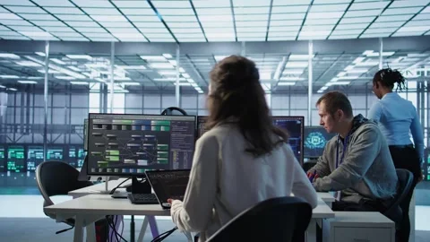 Admin running code on laptop to upgrade artificial intelligence rigs Video stock 319272499