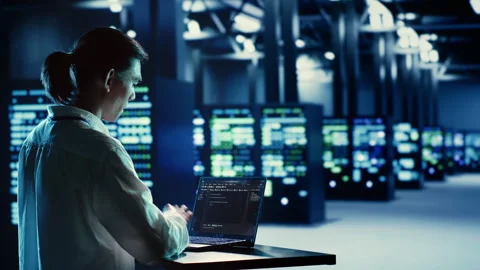 Admin runs code in server farm Stock Footage 251592123