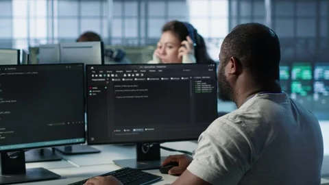 Admin in server hub tasked with protecting valuable data against hacking attacks Stock Footage 319245900