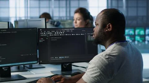 Admin in server hub tasked with protecting valuable data against hacking attacks Stock Photos