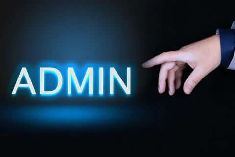 ADMIN text is a word written in neon letters on a black background pointed to Foto stock